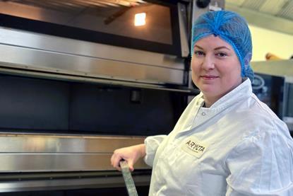 Mary Murphy, test baker at Aryzta, with a sourdough loaf fresh out of the oven