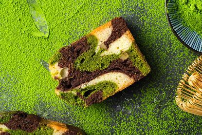 A matcha and chocolate cake with matcha tea