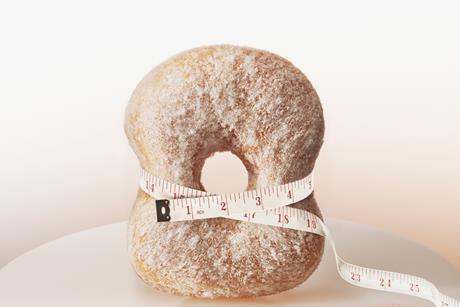 Doughnut and tape measure