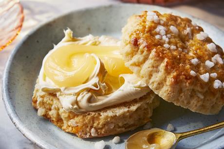 Lemon Drizzle scones with lemon curd and clotted cream on top