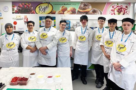 Students of Bradford College wear Regal aprons in the newly upgraded kitchens