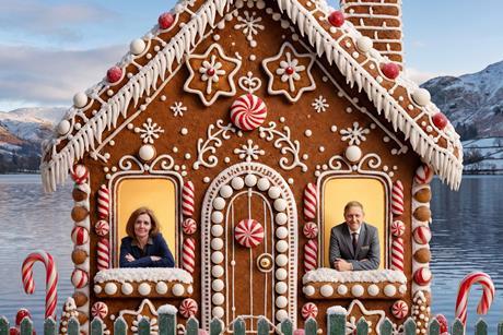 Studio Thameswater - Joanne Hunter and Mark Needham in the windows of a gingerbread house