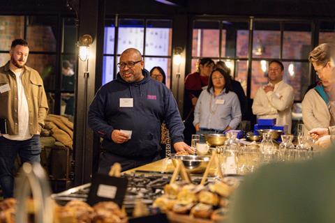 Graham Hornigold joking with the crowd at a bakery event