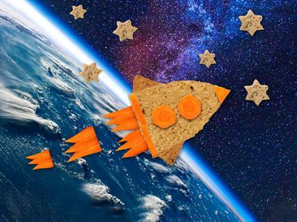 Sandwich rocket on space background