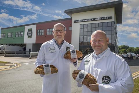 Jones Village Bakery managing director Robin Jones (left) and his brother, projects director Christien Jones, stand outside the 'super bakery' site in Wrexham