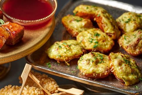 New York pretzel bites topped with pastrami, gherkins, mustard, and cheese