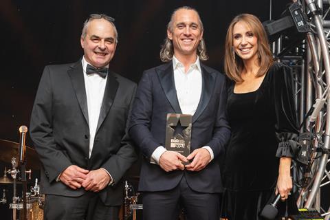 Wildfarmed founder Ed Lees collects the first of two trophies of the night – this one for Bakery Brand of the Year which is presented by category sponsor Craggs & Co’s Stephen Craggs