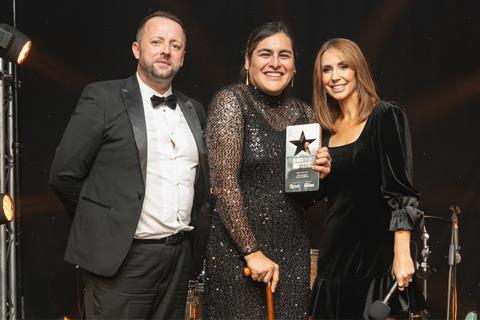 A joyous and glamourous Tona Erreguin from Imma the Bakery proudly clutches the Baker of the Year award, presented by Brook Food & Bakery Equipment sales director, Mike Moran and Alex Jones