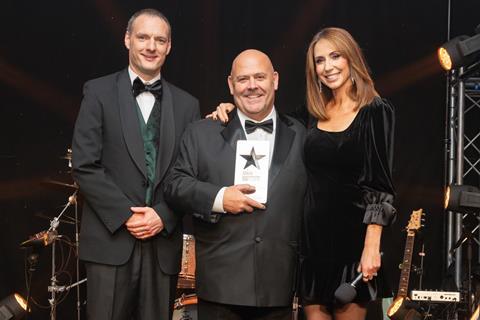 Baker & Baker CEO Matthew Acheson presents Mark Bennett with his second trophy of the night, this time the New Bakery Product of the Year Award for a Dirty Chai, Chocolate & Pistachio Babka