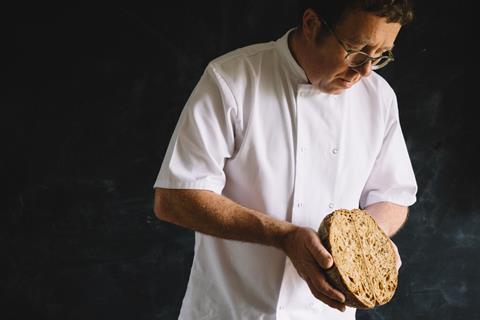 Aidan Monks holding loaf - Lovingly Artisan  2100x1400
