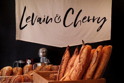Levain & Cherry sign with baguettes