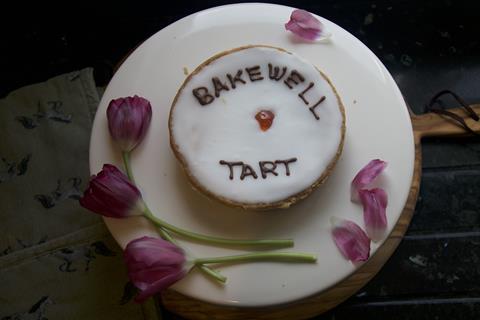 A Bakewell Tart with cherry on top