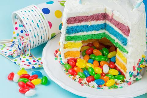 Rainbow pinata cake with jellybean in