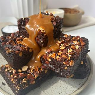 Salted caramel & almond brownie drizzled with caramel sauce - Two Magpies Bakery