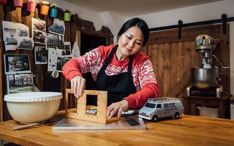 Michelle Wibowo starts construction on the gingerbread house
