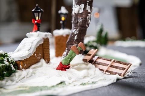 Gingerbread Kevin McCallister is stuck in the snow after falling off his sled