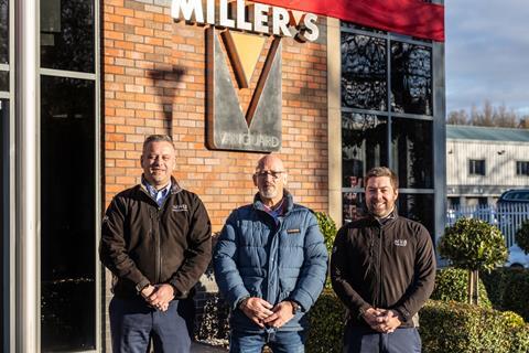 Three men in front of Millers Vanguard offices
