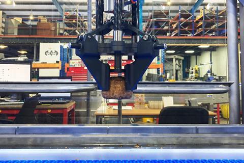 The Compleat Food Group - Robotic arm handling a pork pie at the Tottle site - 2100x1400