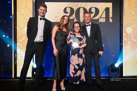 Host Scott Mills and Graeme Williams, chief commercial officer UK for Baker and Baker, present Hajnalka Csordas and Marta Nagy from M’s Bakery with the New Bakery Product of the Year trophy for the second year in a row