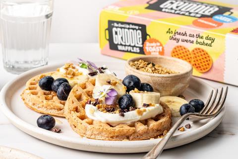 Griddle waffles topped with banana and blueberries