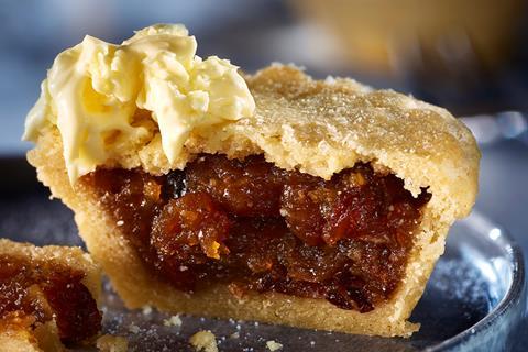 A cross section of a Brown Butter & Spiced Dark Rum Mince Pie