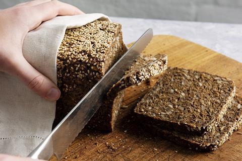 Rye bread being sliced