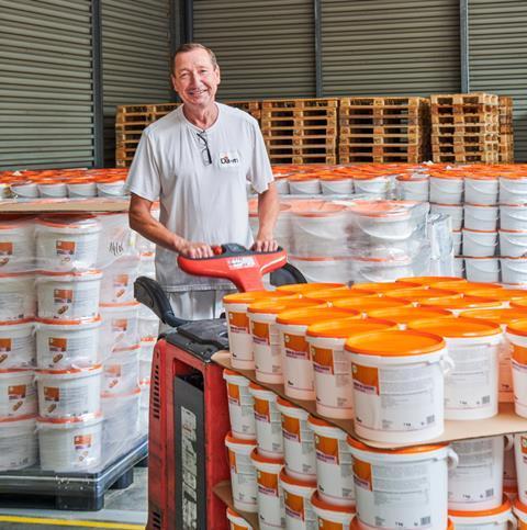 A worker moves ingredients at a Dawn Foods warehouse