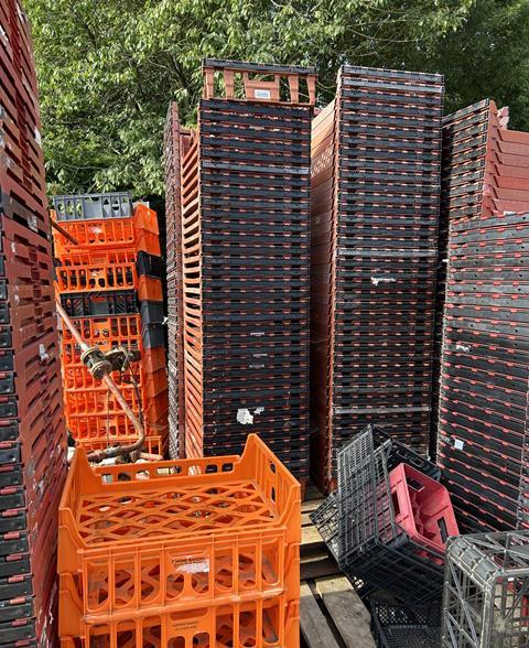 Bakers Basco bread baskets stacked up in a yard