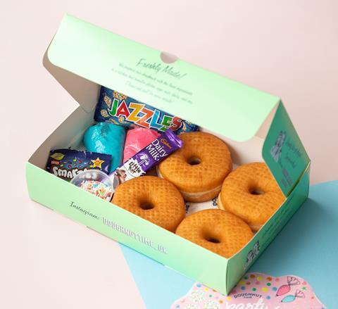 Doughnut Time's DIY kit with plain doughnuts, sweets and icing