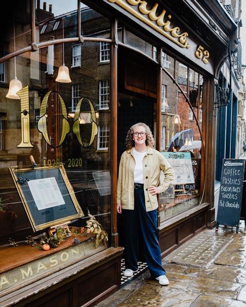 Fitzbillies - Co-owner Alison Wright stands outside the restored bakery shop on Trumpington Street in Cambridge