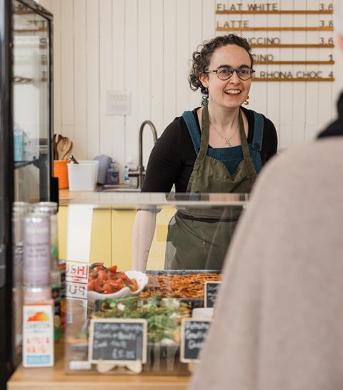 Ems & Co. - Emma Black at counter - 2100x1400