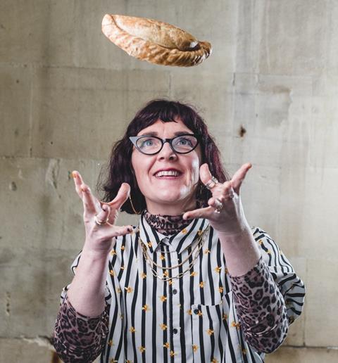 Louise Moye, marketing director at Warrens Bakery, juggles one of their Cornish pasties  1165x1254