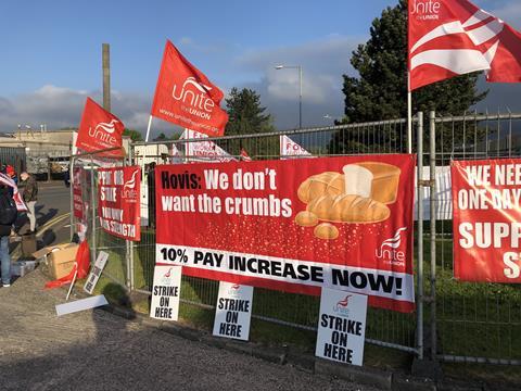 A sign saying 'we don't want crumbs' at the Hovis strike in Belfast