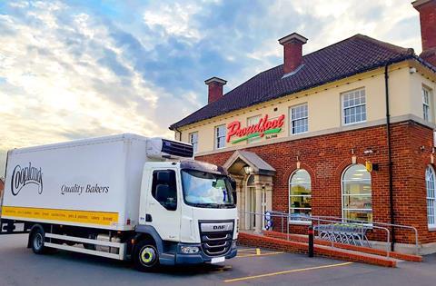 A Cooplands bakery truck outside a Proudfoot supermarket