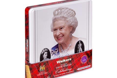 A Walker's biscuit tin with a photo of the Queen on it