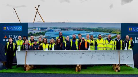 Greggs - Representatives conduct a steel signing ceremony -  2100x1169