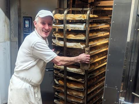 Stacey's Bakery - Baker Wayne Hobson uses the new oven to bake cobs 1238x927
