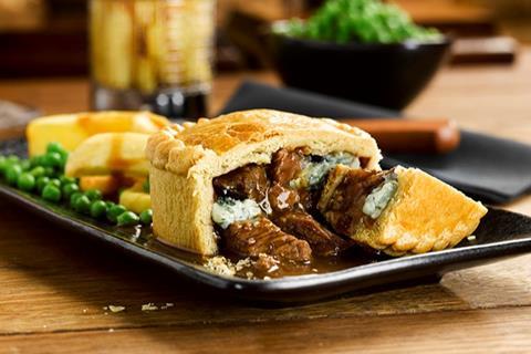 A Steak & Stilton Pie with chips and peas by Turners Pies