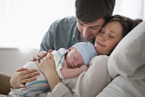 Getty Images - Jose Luis Pelaez Inc -181215741 couple holding newborn baby