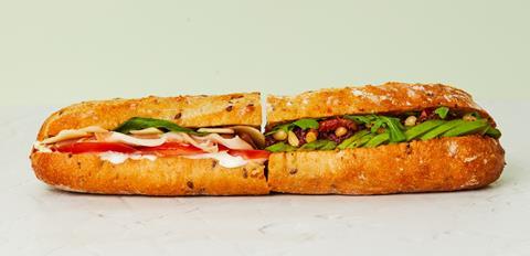 A prosciutto baguette and an avocado, olive and tomato baguette
