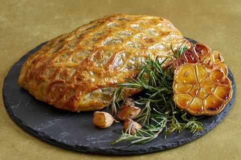 A venison wellington with roasted garlic and rosemary