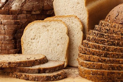 Sliced white and wholemeal loaves