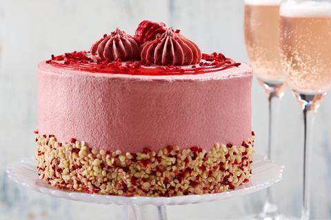 A Ruby Chocolate Cake with pink frosting on top