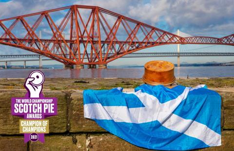 Scotch pie with Scottish flag by river