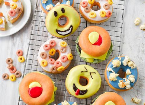 Fun doughnuts with smiley faces and cereal on top