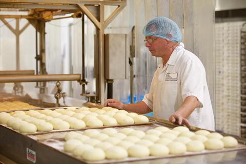 A man at a Greggs manufacturing site