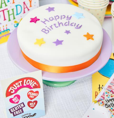 Just Love's gluten-free Happy Birthday Cake, which comes with a label stand to be cutout from its packaging  1727x1800