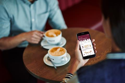 Costa Coffee reward scheme app with coffee in the background