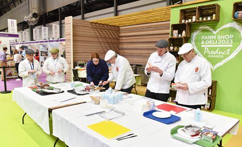 Judges review entries onstage during the Farm Shop & Deli Show 2023 at the Birmingham NEC in April.   2100x1284