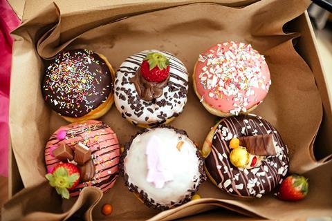 A selection of doughnuts with different toppings